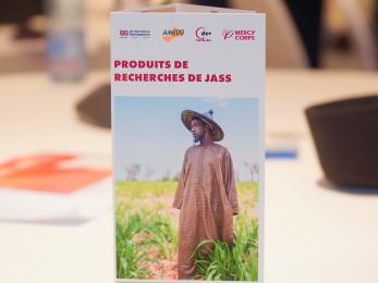 The cover of a brochure of research products of the justice and stability in the sahel (jass) program.